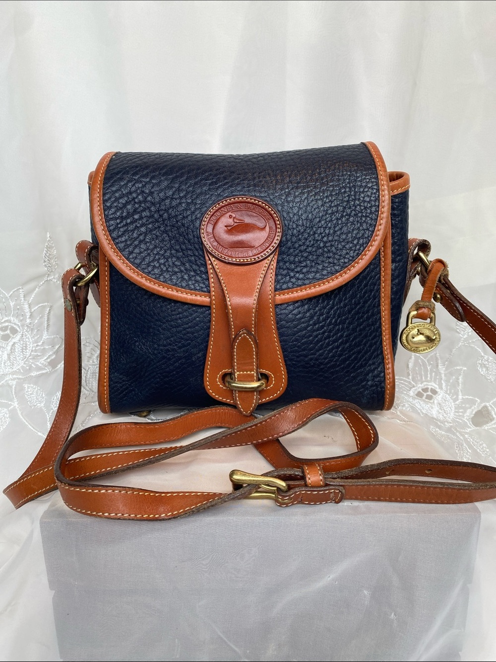 Vintage Dooney & Bourke Essex Navy Pebbled Leather Crossbody with Brown Trim